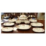 19th Century English porcelain part dinner service decorated with foliate sprays and including a