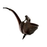 Late 19th Century Black Forest carved pipe, the bowl formed as an inverted Pickelhaube surmounted