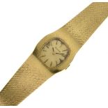 Bulova - Lady's 18ct gold manual bracelet watch, the gilt dial with gilt black batons and black