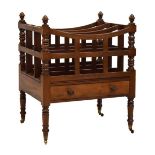 Mahogany three-division canterbury of slatted form over drawer, the blocked and turned uprights