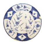 18th Century Delft blue and white painted charger, probably Bristol, having central stylised foliate