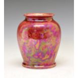 Ruskin high fired ovoid vase, having a mottled pink glaze, impressed marks, 18.75cm high