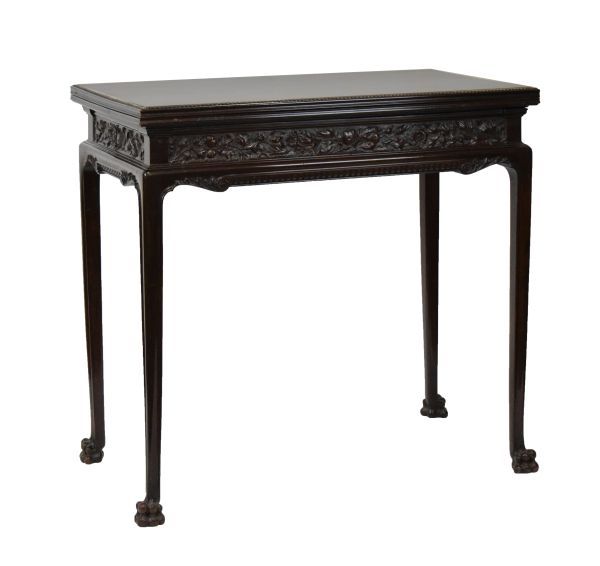 Early 20th Century carved mahogany rectangular fold-over card table, having a finely carved