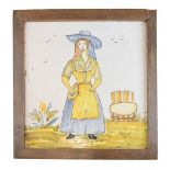 Late 19th/early 20th Century French faience tile plaque, typically polychrome decorated with a