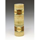 Troika large cylinder vase, having two bands of decoration on a mottled light brown ground,