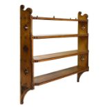 Set of late Victorian Gothic Revival ash and ebonised open wall shelves, the four shelves with re-