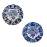 Pair of 18th Century Dutch Delft plates, each having blue and white painted decoration with a