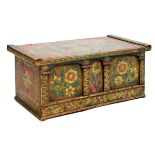 19th Century Eastern European painted pine casket or box having a hinged flowered decorated cover,