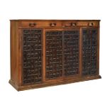 19th Century Continental carved walnut side cabinet, the moulded rectangular top over two frieze
