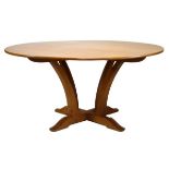 Craftsman-made golden oak circular dining or centre table by Peter Hall, Staveley, Cumbria, the