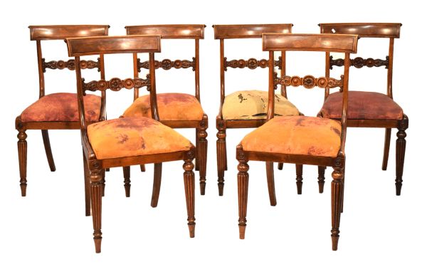 Set of six Regency/George IV rosewood dining chairs, each having panelled figured top rail over