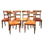 Set of six Regency/George IV rosewood dining chairs, each having panelled figured top rail over