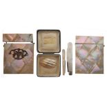 Assorted mother-of-pearl items to include; Victorian silver-bladed folding pocket fruit knife, two