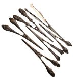 Six pairs of silver glove stretchers