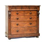 Victorian mahogany chest of drawers having shaped frieze drawer over two short and three long