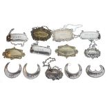 Thirteen various silver plated and base metal spirit labels to include; two sets of three and a pair