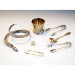 Various silver items to include; George V tumbler, Birmingham 1910, three pairs of sugar tongs,