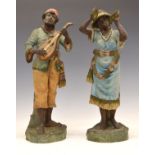 Pair of late 19th Century Continental terracotta figures, probably Austrian, each depicting a street