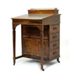 Late Victorian/Edwardian inlaid rosewood davenport having a brass ¾ gallery to the hinged