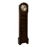 1930's period striking and chiming longcase clock, the silvered dial with Arabic numerals,