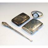 Various silver items to include; two silver cigarette cases, 4.4toz, lady's wristwatch and button