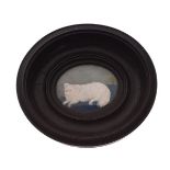 Late 19th/early 20th Century painted oval miniature of a small dog, perhaps a Papillon, the white