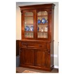 Victorian mahogany secretaire bookcase, the upper section having a cavetto-moulded cornice over