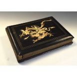 Early 20th Century Japanese ivory-mounted ebonised photograph album, the cover decorated with a