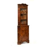 Old reproduction yew-wood veneered floor standing corner cabinet in the early 18th Century taste,