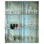 Large quantity of 19th/20h Century table glass including; rummers, decanters, vases, pressed moulded