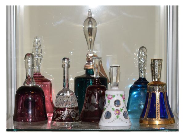 Collection of 19th/20th Century glass bells, the tallest standing 25cm high (8)
