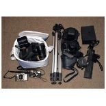 Box containing an assortment of cameras and accessories to include; Olympus, Hanimex etc