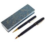 Vintage 'Blackbird' fountain pen with 14ct gold nib and retractable pencil, both with blue marbled