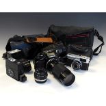 Cameras - Olympus OM40 camera with 50mm Zuiao lens, Tamron zoom lens, together with an Olympus