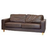 Contemporary brown leather settee, raised on beech supports, approx 204cm wide