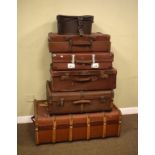 Five assorted vintage trunks and cases, two with wooden ribs, largest 90cm wide, together with a