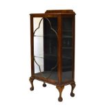 Early 20th Century walnut display cabinet fitted two glass shelves enclosed by glazed door, 66cm