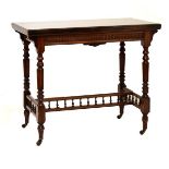 Victorian walnut rectangular fold-over top card table having moulded cushion frieze raised on turned