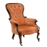 Victorian walnut armchair having acanthus carved scroll arms, raised on cabriole supports with