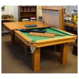 Modern light oak framed slate bed pool table having optional dining table top in two sections,