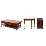 Reproduction walnut console table, a similar cupboard, and a rectangular two tier coffee table