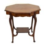 Victorian walnut octagonal top centre table having shaped apron and acanthus knee carved cabriole