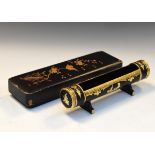 Early 20th Century Burmese black-lacquered pen tray of cylindrical cradle form marked beneath '