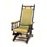 American ebonised beech framed rocking chair
