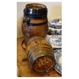 Two metal-bound coopered oak barrels, one advertising 'Old Brown', the larger 44cm high (2)