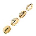 Four assorted 9ct gold, yellow metal and unmarked rings, various sizes, 20.2g gross approx (4)