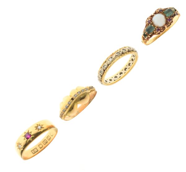 Four various 18ct gold and unmarked yellow metal rings, to include; an opal-set example, various