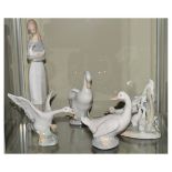 Lladro figure of a goose and four other Nao figures of geese, and a Nao figure of girl holding duck,