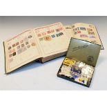 Stamps - Collection of World stamps in two albums, together with a tin of loose stamps