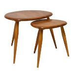 Ercol - Nest of two blonde elm and beech pebble tables, the largest 49cm wide